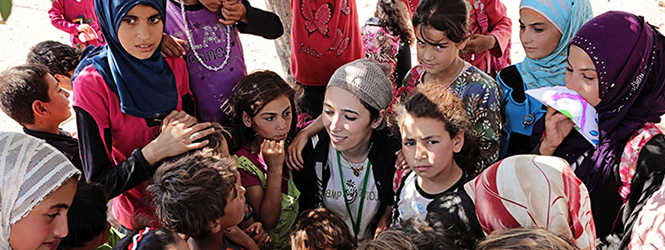 Photo of Lina Sergie Attar with Syrian women