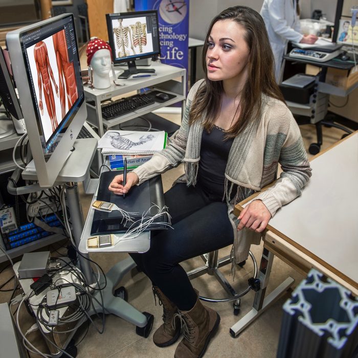 This Cleveland Institute of Art Biomedical Art major illustrates patient education materals in an internship at a nearby hospital.