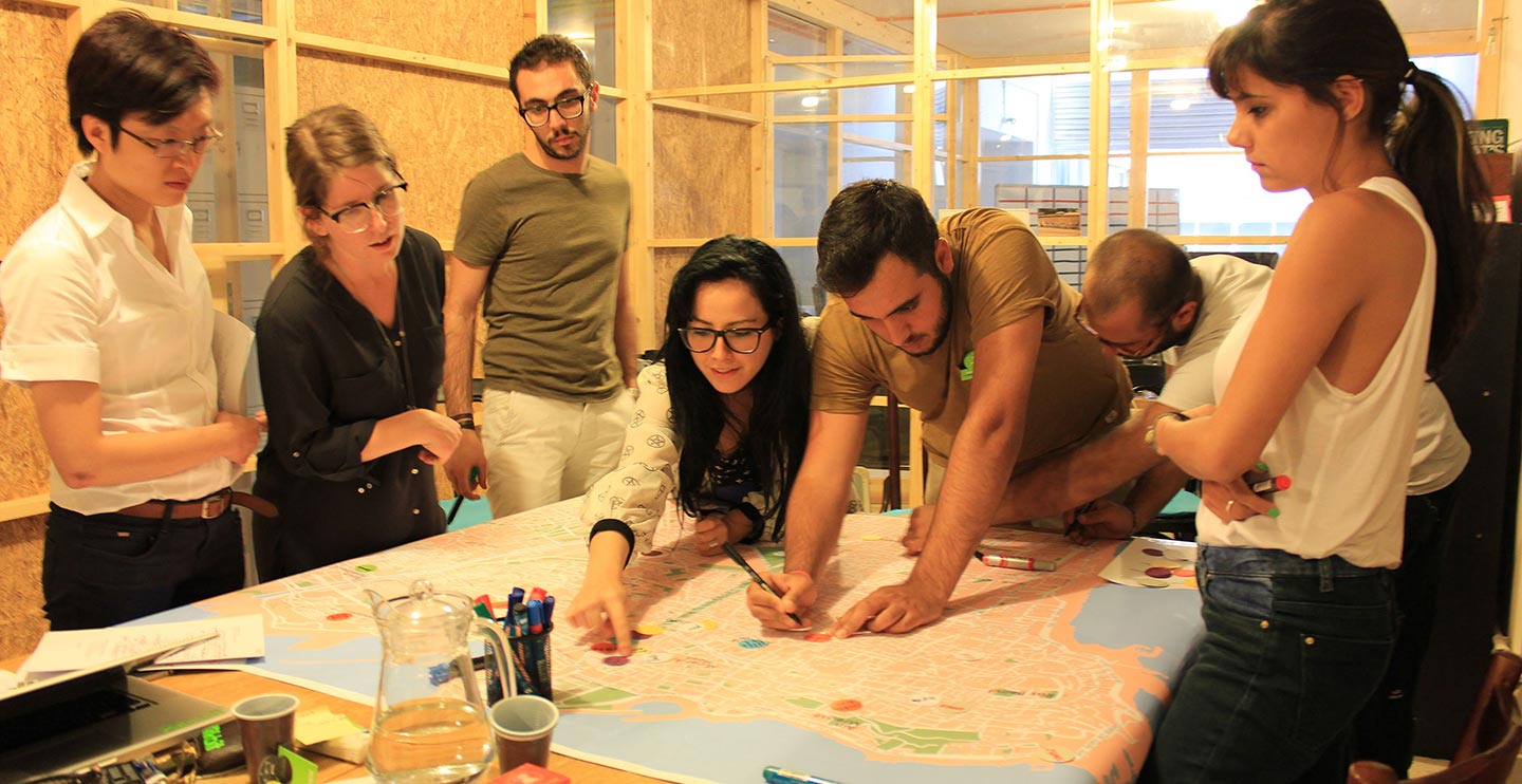 Group of students working around a table