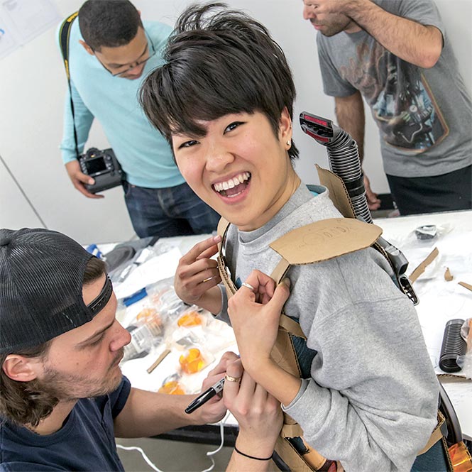 Students working together on a costume design